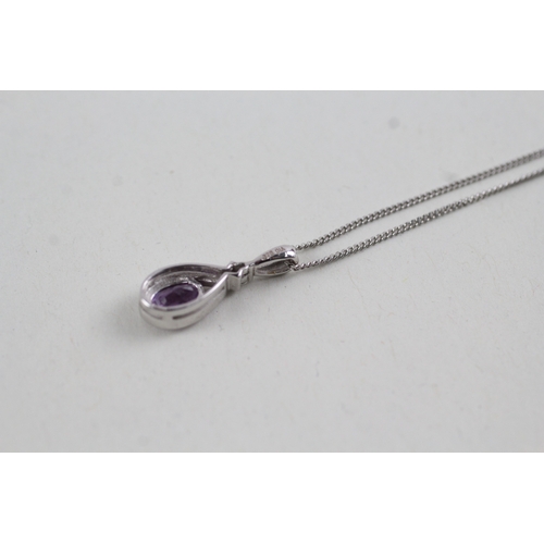 159 - 9ct gold amethyst and diamond pendant on chain (1.9g)