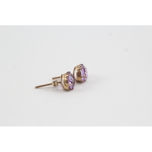 162 - 9ct gold amethyst stud earrings (1.4g)