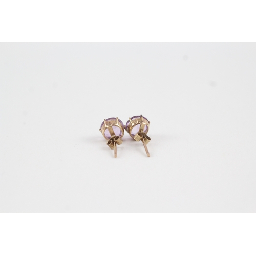 162 - 9ct gold amethyst stud earrings (1.4g)