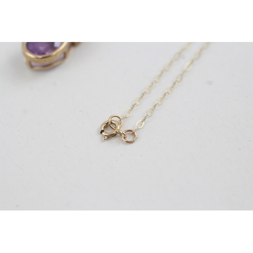 163 - 9ct gold amethyst pendant on chain (2g)