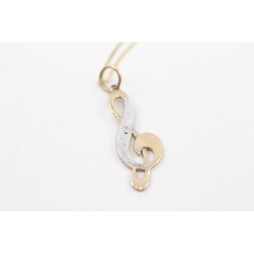 192 - 9ct gold and diamond music note pendant on chain (1.5g)