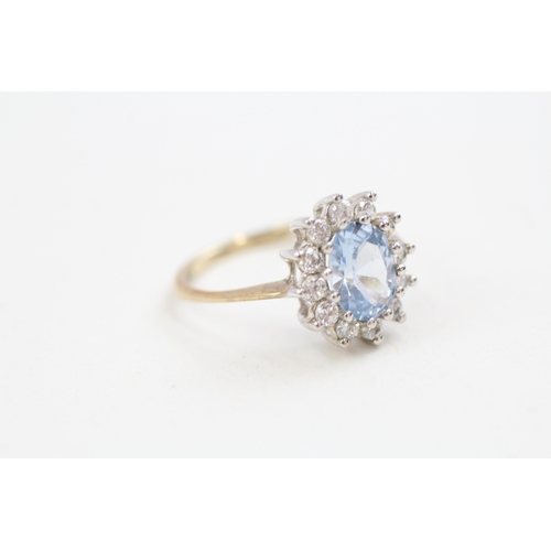 201 - 9ct gold cubic zirconia and blue gemstone set cluster ring (2.2g)