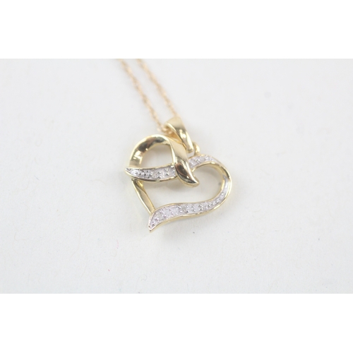 215 - 9ct gold diamond heart shape pendant necklace (1.2g)