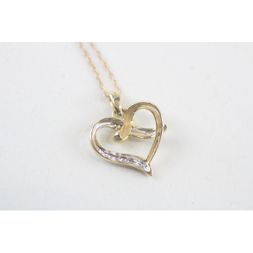 215 - 9ct gold diamond heart shape pendant necklace (1.2g)