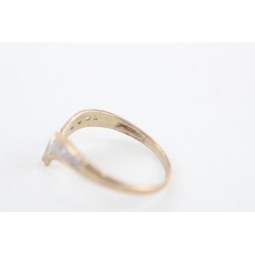 243 - 9ct gold sapphire & cubic zirconia wishbone ring (1.6g)