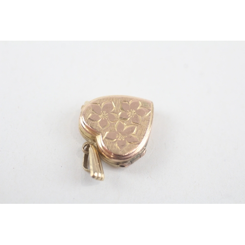 251 - 9ct gold heart shape patterned locket (1.9g)