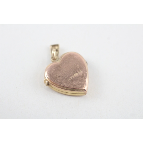 251 - 9ct gold heart shape patterned locket (1.9g)