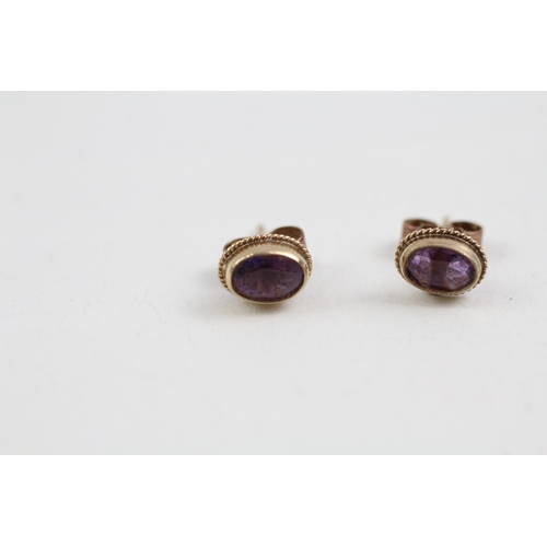 286 - 9ct gold amethyst single stone stud earrings (0.9g)