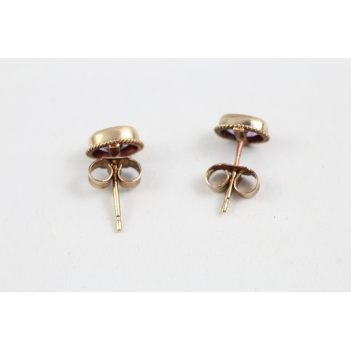 286 - 9ct gold amethyst single stone stud earrings (0.9g)