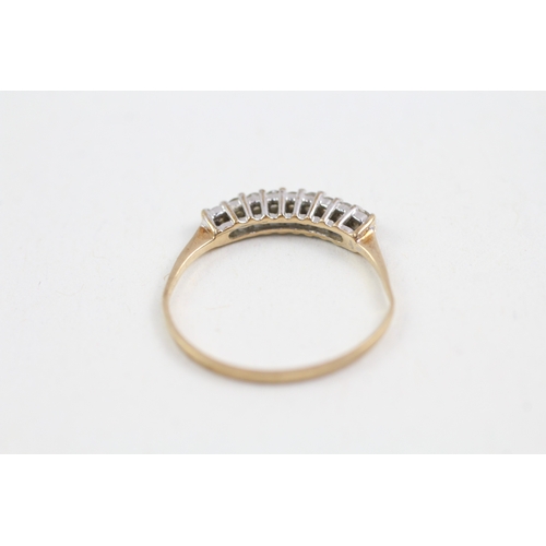 288 - 9ct gold cubic zirconia nine stone ring (0.9g)