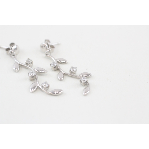 291 - 9ct white gold cubic zirconia leaf drop earrings (2.9g)