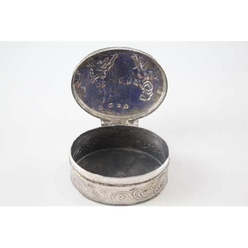 27 - .900 silver snuff box w/ cherub detail