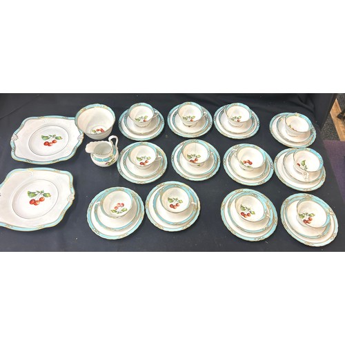 469 - Tuscan china turquoise tea set decorated with fruit, 12 place setting, (1 cup cracked) no teapot