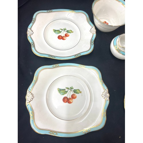 469 - Tuscan china turquoise tea set decorated with fruit, 12 place setting, (1 cup cracked) no teapot