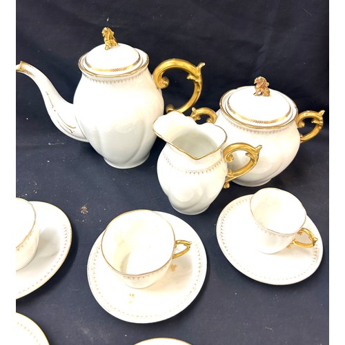 468 - Vintage part white tea service with gold detailing, to include 4 coffee cups and saucers, 4 tea cups... 