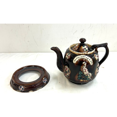 116 - Small Bargeware teapot with stand, small chips to base, overall height 7.5 inches