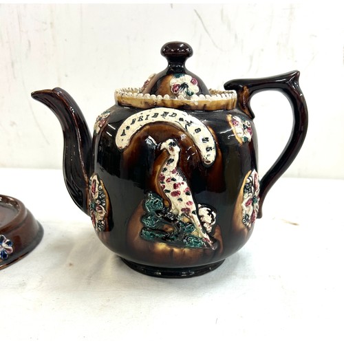 116 - Small Bargeware teapot with stand, small chips to base, overall height 7.5 inches