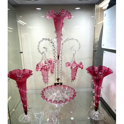 472 - Cranberry Epergne with 2 matching vases, overall good condition, approximate measurements Height 22 ... 