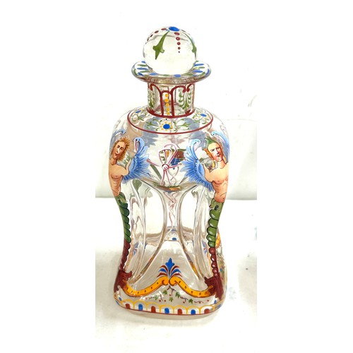 109 - Pair antique hand painted squeezed glass decanters with 4 cordials, height of decanter 10.5 inches