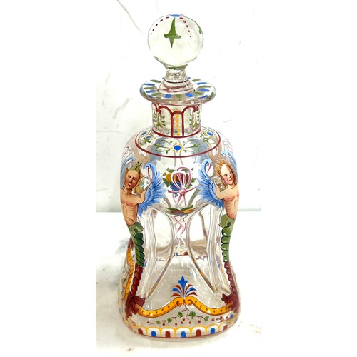 109 - Pair antique hand painted squeezed glass decanters with 4 cordials, height of decanter 10.5 inches