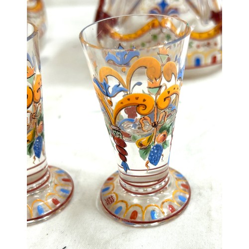 109 - Pair antique hand painted squeezed glass decanters with 4 cordials, height of decanter 10.5 inches