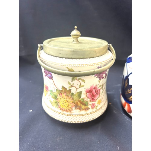 105 - 3 Vintage china biscuit barrels