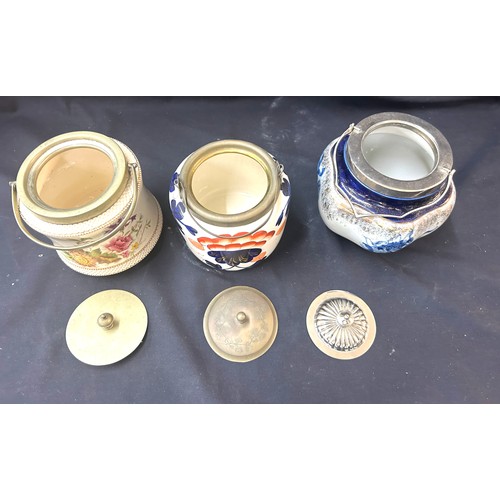 105 - 3 Vintage china biscuit barrels