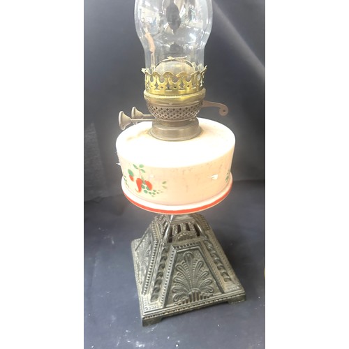 478 - 3 Vintage oil lamps, all with funnels one with shade