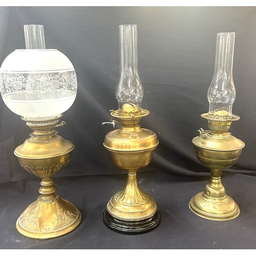 477 - 3 Vintage oil lamps, all with funnels, 1 with shade