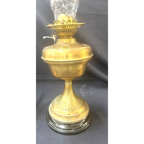 477 - 3 Vintage oil lamps, all with funnels, 1 with shade