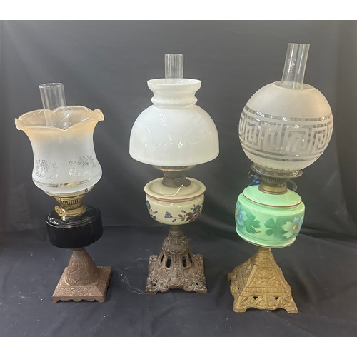 480 - 3 Vintage oil lamps, all with funnels, all with shades