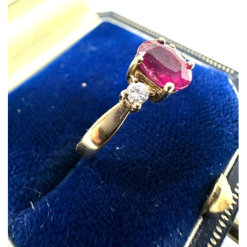 87 - 9ct gold ruby & diamond ring weight 2.2g 0.10 ct diamonds