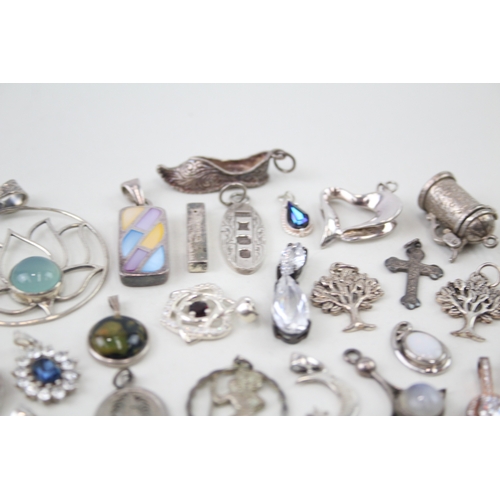 348 - Assortment of Sterling Silver Pendants inc. Locket, MOP, Charms, Cross 82g