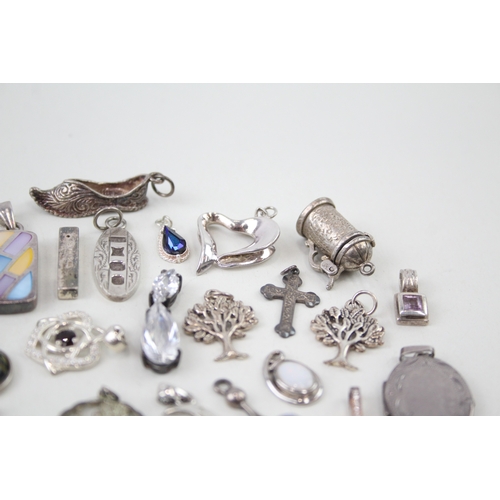 348 - Assortment of Sterling Silver Pendants inc. Locket, MOP, Charms, Cross 82g