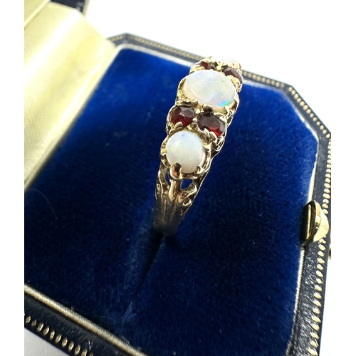 107 - 9ct gold opal & garnet ring weight 2.1g