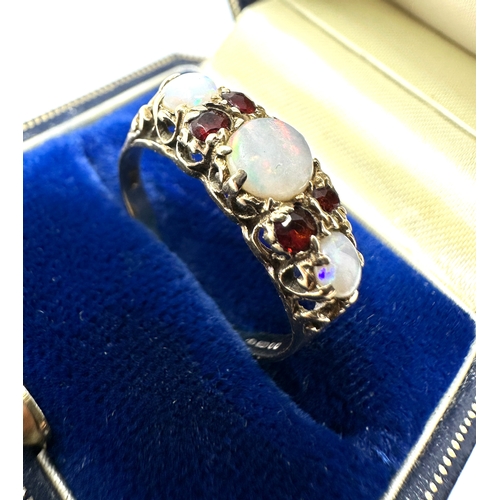 107 - 9ct gold opal & garnet ring weight 2.1g