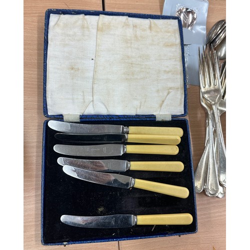 451 - Large selection of EPNS cutlery a long with some silver handled knives