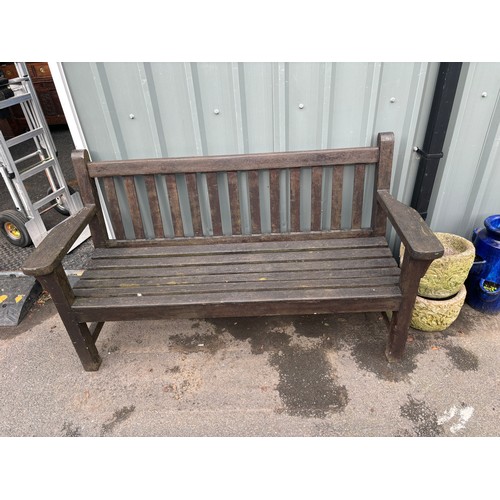 100P - Wooden garden bench measures approximately 35 inches tall, length 63 inches