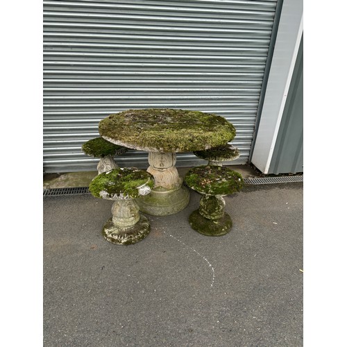 100U - Concrete garden table with 4 concrete garden stools table measures approximately 28 inches tall 41 i... 