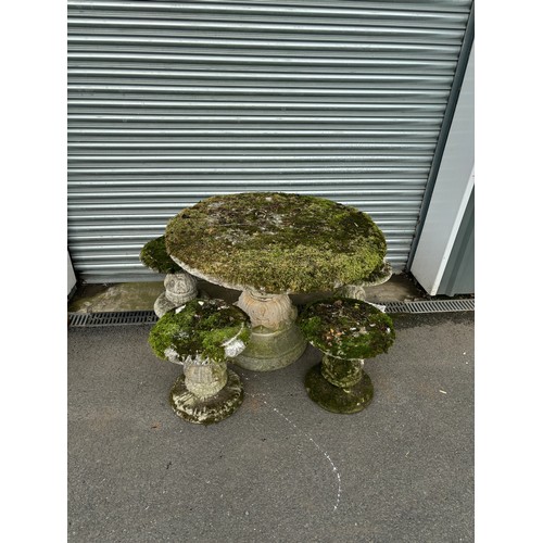 100U - Concrete garden table with 4 concrete garden stools table measures approximately 28 inches tall 41 i... 