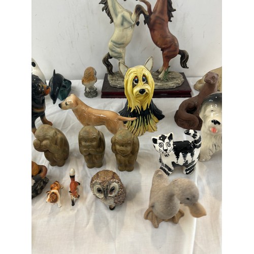 156 - Selection of various porcelain animal figures to include horses, dogs, monkeys etc