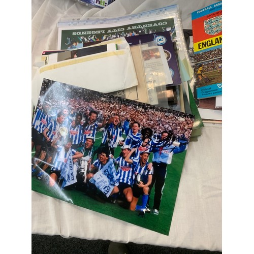 151 - Large selection of assorted Football memorabilia includes Programmes, Books, some signed etc