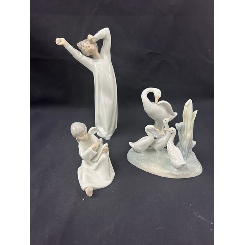 461 - Selection of 3 Nao, 1 Lladro ornaments to include children and ducks , tallest measures approximatel... 