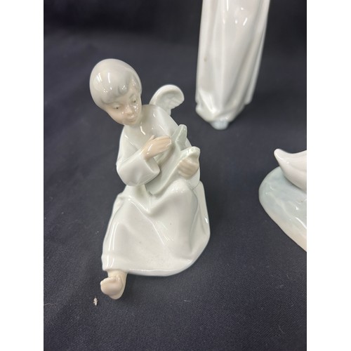 461 - Selection of 3 Nao, 1 Lladro ornaments to include children and ducks , tallest measures approximatel... 