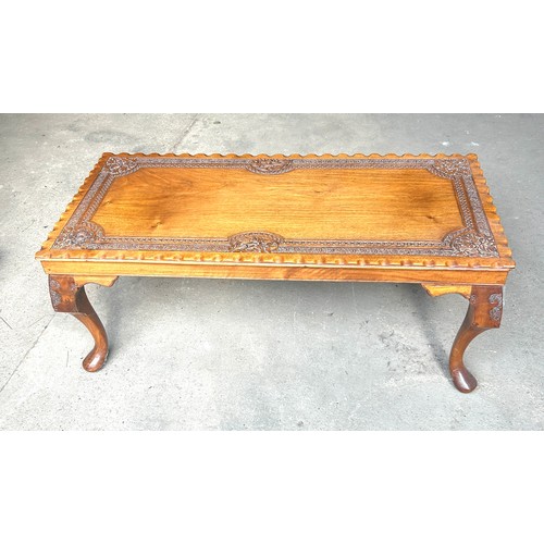 435B - Mahogany carved top coffee table, approximate measurements: Height 16 inches, Width 39 inches, Depth... 