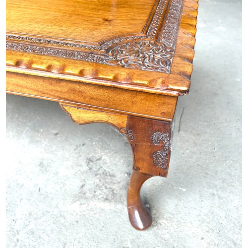 435B - Mahogany carved top coffee table, approximate measurements: Height 16 inches, Width 39 inches, Depth... 