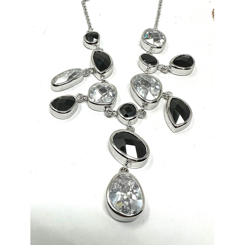 252 - 2 silver gemstone set pendant necklaces weight 52g