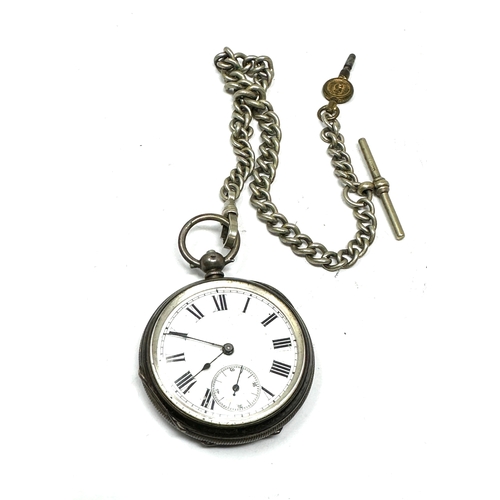 456 - Antique silver pocket watch & nickel watch chain  the watch is ticking not tested