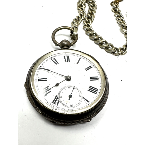 456 - Antique silver pocket watch & nickel watch chain  the watch is ticking not tested