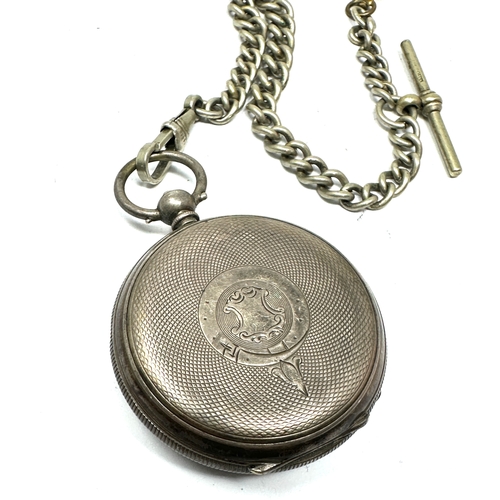 456 - Antique silver pocket watch & nickel watch chain  the watch is ticking not tested